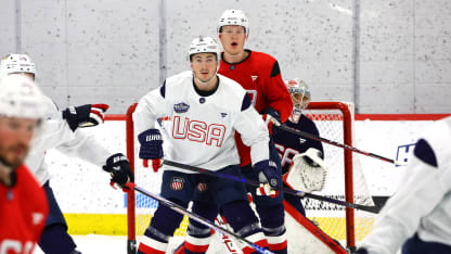 Zach Werenski #8 and Brady Tkachuk #7 of Team USA stand in front of goaltender Connor Hellebuyck #37 during practice for the NHL 4 Nations Face-Off at CN Sports Complex on February 10, 2025 in Brossard, Quebec. (Photo by Vitor Munhoz/4NFO/World Cup of Hockey via Getty Images)