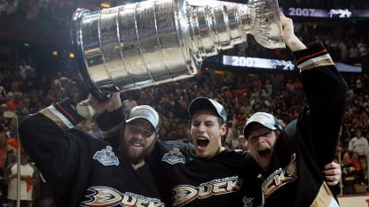 Dustin Penner #17, Ryan Getzlaf #15 and Corey Perry #10 of the Anaheim Ducks celebrate lifting the Stanley Cup after defeating the Ottawa Senators in Game Five of the 2007 Stanley Cup finals on June 6, 2007 at Honda Center in Anaheim, California. The Ducks defeated the Senators 6-2 to win the Stanley Cup Finals 4 games to 1. (Photo by Jim McIsaac/Getty Images)