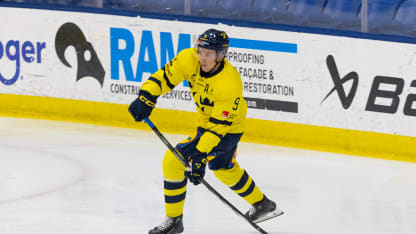 Theo Lindstein #9 of Team Sweden passes the puck during the 2024 World Junior Summer Showcase between Finland and Sweden at USA Hockey Arena on August 3, 2024 in Plymouth, Michigan. (Photo by Michael Miller/ISI Photos/Getty Images)