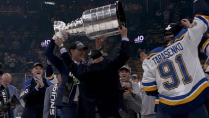 Bob Plager lifts the Stanley Cup