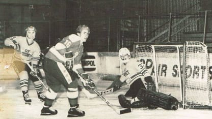 Sandi Logan (playing defense) and Mike Johnston (center) playing in Australia in the early 1980s