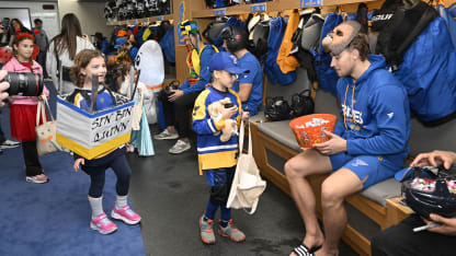 St. Louis Blues trick or treat with local children hospital patients