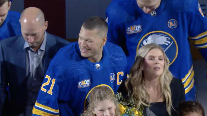 Kyle Okposo celebrates 1000th NHL game