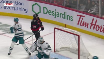 Batherson deflects it in