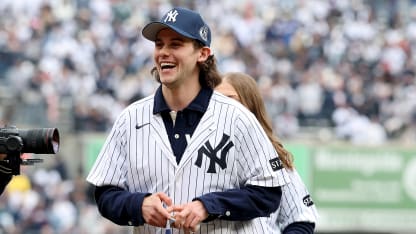 Jack Hughes Aerin Frankel throw out first pitch at Yankees game