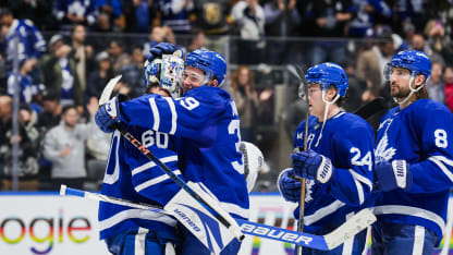 Fraser Minten #39 congratulates Joseph Woll #60 of the Toronto Maple Leafs on a shut out victory over the Vegas Golden Knights during the third period at the Scotiabank Arena on November 20, 2024 in Toronto, Ontario, Canada. (Photo by Kevin Sousa/NHLI via Getty Images)