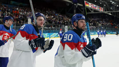 Oliver Okuliar #8 and Tomas Tatar #90 of Team Slovakia acknowledge the fans after the team's 3-2 victory in the Men's Preliminary Group B match between Italy and Slovakia on day seven of the Milano Cortina 2026 Winter Olympic games at Milano Rho Ice Hockey Arena on February 13, 2026 in Milan, Italy. (Photo by Elsa/Getty Images)