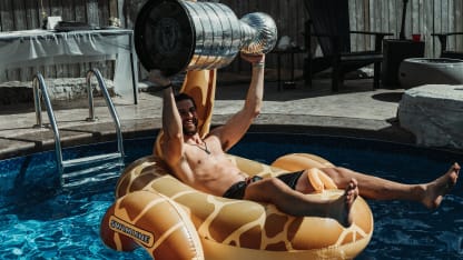 Golden Knights' Hague swims with Stanley Cup