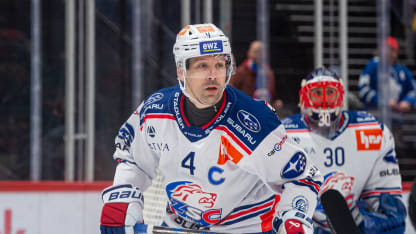 Patrick Geering #4 of ZSC Lions looks on prior the Swiss National League game between Lausanne HC and ZSC Lions at Vaudoise Arena on February 15, 2025 in Lausanne, Switzerland. (Photo by RvS.Media/Monika Majer/Getty Images)