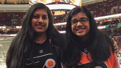 Namita Nandakumar attends a Flyers game with her younger cousin.