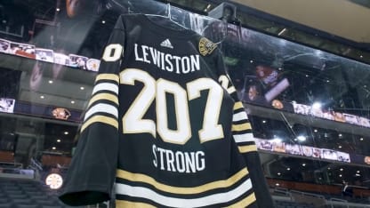 Bruins honor victims of Maine shooting before game