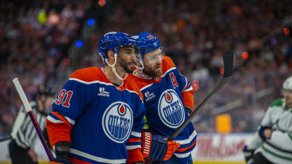 Leon Draisaitl #29 and Evander Kane #91 of the Edmonton Oilers talk before a faceoff during the first period against the Dallas Stars in Game Four of the Western Conference Final of the 2025 Stanley Cup Playoffs at Rogers Place on May 27, 2025 in Edmonton, Alberta, Canada. (Photo by Paul Swanson/NHLI via Getty Images)