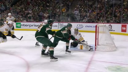 Kaprizov flips in a backhand shot