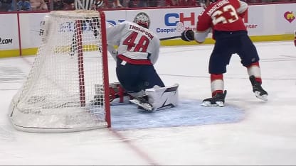 Marchand tucks in a backhand