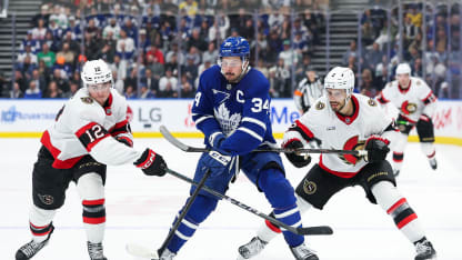 Auston Matthews #34 of the Toronto Maple Leafs controls the puck against the Ottawa Senators during the second period at Scotiabank Arena on March 15, 2025 in Toronto, Ontario, Canada. (Photo by Michael Chisholm/Getty Images)