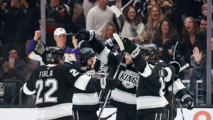 Alex Laferriere #14 of the Los Angeles Kings celebrates scoring a goal with teammates Kevin Fiala #22, Jordan Spence #21, Alex Turcotte #15 and Phillip Danault #24 in the second period during the game against the Minnesota Wild at Crypto.com Arena on December 07, 2024 in Los Angeles, California. (Photo by Nicole Vasquez/NHLI via Getty Images)