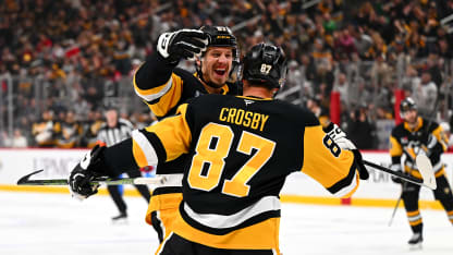 Rickard Rakell #67 celebrates with Sidney Crosby #87 of the Pittsburgh Penguins during the 1st period against the Detroit Red Wings at PPG PAINTS Arena on March 31, 2026 in Pittsburgh, Pennsylvania. (Photo by Joe Sargent/NHLI via Getty Images)