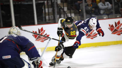 Luke Hughes #43 of Team USA stock checks Oswald Veit #20 of Team Germany in the first period in a Quarterfinal game during the 2023 IIHF World Junior Championship at Avenir Centre on January 2, 2023 in Moncton, Canada. (Photo by Dale Preston/Getty Images)