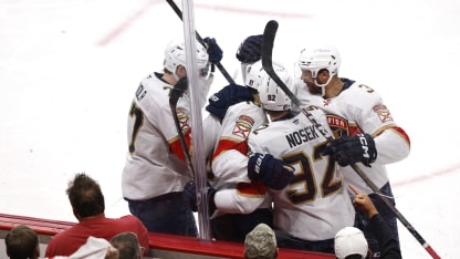 A.J. Greer #10 of the Florida Panthers celebrates with teammates after scoring a goal against the Carolina Hurricanes during the second period in Game One of the Eastern Conference Final of the 2025 Stanley Cup Playoffs at Lenovo Center on May 20, 2025 in Raleigh, North Carolina. (Photo by Jaylynn Nash/Getty Images)