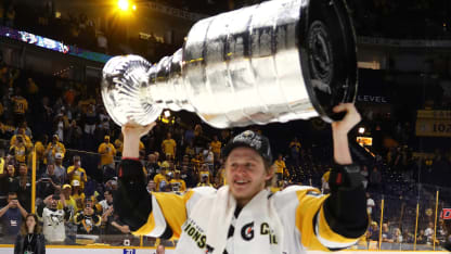 Jake Guentzel hoisting Stanley Cup 2017