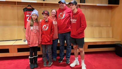 NHL Jack Hughes with Charlie Shomers and family