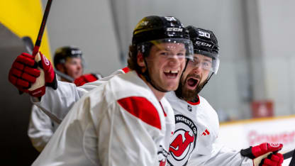 Tomas Tatar #90 and Dawson Mercer #91of the New Jersey Devils