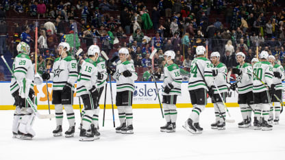 The Dallas Stars celebrate their NHL game win against the Vancouver Canucks at Rogers Arena on March 28, 2024 in Vancouver, British Columbia, Canada. Dallas won 3-1. (Photo by Jeff Vinnick/NHLI via Getty Images)