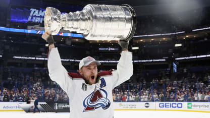 Mikko Rantanen #96 of the Colorado Avalanche carries the Stanley Cup following the series winning victory over the Tampa Bay Lightning in Game Six of the 2022 NHL Stanley Cup Final at Amalie Arena on June 26, 2022 in Tampa, Florida. (Photo by Bruce Bennett/Getty Images)