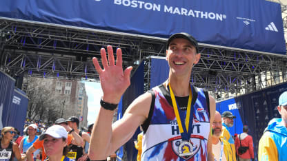 Zdeno Chara, who played 24 years in the National Hockey League (NHL) and captained the Boston Bruins 2011 Stanley Cup championship team, waves to spectators after finishing the 128th Boston Marathon on April 15, 2024 in Boston, MA. Chara finished with a time of 03:30:52. (Photo by Erica Denhoff/Icon Sportswire via Getty Images)