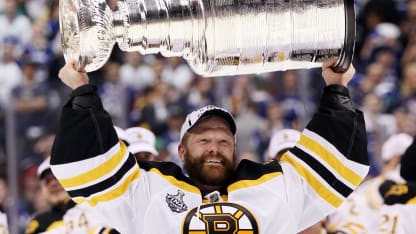 Tim Thomas BOS lifting Stanley Cup 2011
