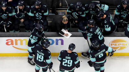 SEATTLE, WASHINGTON - JANUARY 06: Assistant coach Jessica Campbell of Seattle Kraken gathers the team during the third period against the New Jersey Devils at Climate Pledge Arena on January 06, 2025 in Seattle, Washington. (Photo by Steph Chambers/Getty Images)