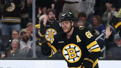 BOSTON, MASSACHUSETTS - MARCH 24: David Pastrnak #88 of the Boston Bruins celebrates after assisting a goal by Charlie McAvoy #73 during the third period against the Toronto Maple Leafs at TD Garden on March 24, 2026 in Boston, Massachusetts. The Leafs defeat the Bruins 4-2. (Photo by Maddie Meyer/Getty Images)