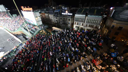 Fans watch the Discover NHL Winter Classic between the Chicago Blackhawks and the St. Louis Blues at Wrigley Field on December 31, 2024 in Chicago, Illinois. (Photo by Adam Eberhardt/NHLI via Getty Images)