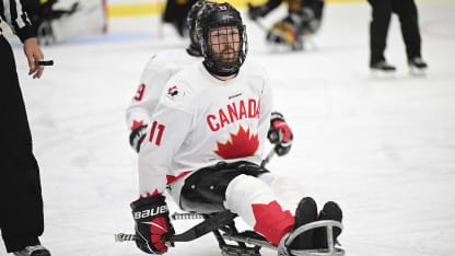 Adam Dixon sled hockey skating