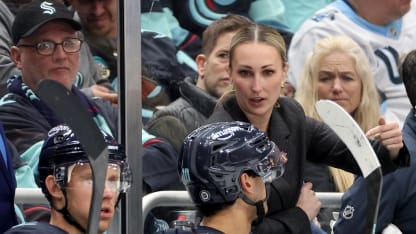 SEATTLE, WASHINGTON - MARCH 14: Assistant coach Jessica Campbell of the Seattle Kraken motions toward Matty Beniers #10 during the game against the Utah Hockey Club at Climate Pledge Arena on March 14, 2025 in Seattle, Washington. (Photo by Steph Chambers/Getty Images)