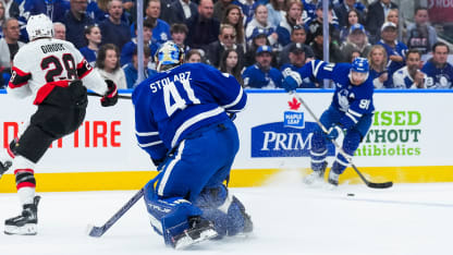 Stolarz leaves the net to clear the puck