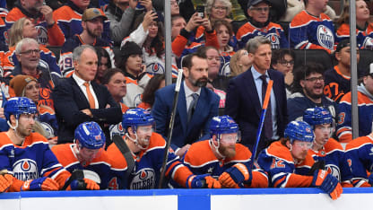 Kris Knoblauch, Mark Stuart and Paul Coffey of the Edmonton Oilers look on from the bench during the game against the Los Angeles Kings at Rogers Place on January 13, 2025, in Edmonton, Alberta, Canada. (Photo by Andy Devlin/NHLI via Getty Images)