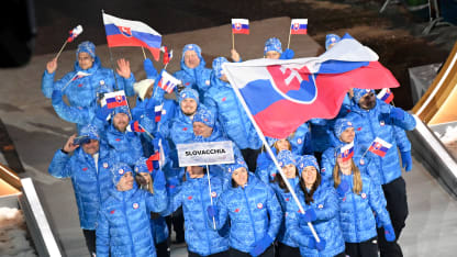 Flagbearer Viktoria Cernanska of Team Slovakia enters with the team into the stadium during the opening ceremony of the Milano Cortina 2026 Winter Olympics at Piazza Dibona on February 06, 2026 in Cortina d'Ampezzo, Italy. (Photo by Mattia Ozbot/Getty Images)