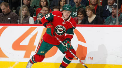 Marian Gaborik #10 of the Minnesota Wild skates with the puck against the Calgary Flames during the game at the Xcel Energy Center on April 3, 2009 in Saint Paul, Minnesota. (Photo by Bruce Kluckhohn/NHLI via Getty Images)