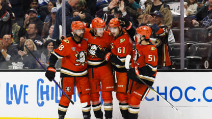 Oliver Kylington #58 of the Anaheim Ducks, Leo Carlsson #91 of the Anaheim Ducks, Cutter Gauthier #61 of the Anaheim Ducks and Olen Zellweger #51 of the Anaheim Ducks celebrate a goal during the second period against the Toronto Maple Leafs at Honda Center on March 30, 2025 in Anaheim, California. (Photo by Ric Tapia/Getty Images)