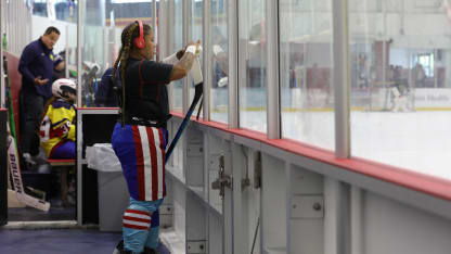 LATAM CUP Team Puerto Rico player taping up stick before game vs TEAM ROTW