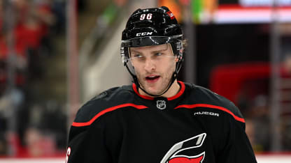 Carolina Hurricanes right wing Mikko Rantanen (96) talks to a teammate during a television timeout during the NHL game between the Chicago Blackhawks and the Carolina Hurricanes on January 30, 2025 at Lenovo Center in Raleigh, North Carolina. (Photo by Katherine Gawlik/Icon Sportswire via Getty Images)