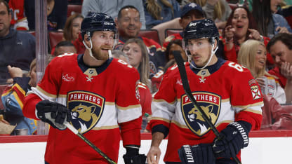 : Sam Bennett #9 and Brad Marchand #63 of the Florida Panthers skate during a break in action against the Utah Hockey Club at the Amerant Bank Arena on March 28, 2025 in Sunrise, Florida. (Photo by Joel Auerbach/Getty Images)