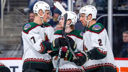 Nick Bjugstad #17, J.J. Moser #90 and Patrik Nemeth #2