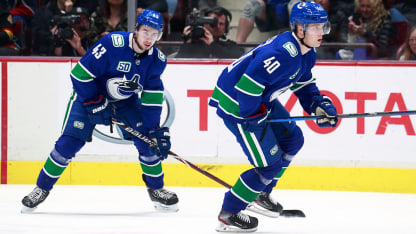 Hughes, Pettersson sign with Vancouver Canucks