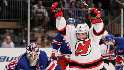 Patrik Elias #26 of the New Jersey Devils celebrates scoring a first period goal past Artem Anisimov #42 and Henrik Lundqvist #30 of the New York Rangers in Game Five of the Eastern Conference Final during the 2012 NHL Stanley Cup Playoffs at Madison Square Garden on May 23, 2012 in New York City. (Photo by Bruce Bennett/Getty Images)