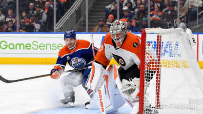 Dan Vladar #80 of the Philadelphia Flyers tracks the puck along with Zach Hyman #18 of the Edmonton Oilers during the second period of the game at Rogers Place on January 3, 2026, in Edmonton, Alberta, Canada. (Photo by Andy Devlin/NHLI via Getty Images)