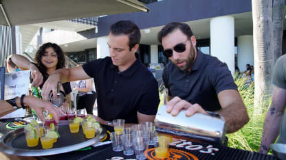 LA-Kings-Players-Taste-of-the-South-Bay-Pouring-Drinks