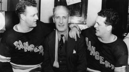 Canadian-born professional hockey player, coach and general manager Lester Patrick (1883 - 1960) of the New York Rangers (center) poses with his sons, Rangers players Lynn (1912 - 1980) (left), and Muzz (1915 - 1998) (right), 1940. Lester Patrick was the coach and general manager of the New York Rangers from 1926-1939. (Photo by Bruce Bennett Studios via Getty Images Studios/Getty Images)
