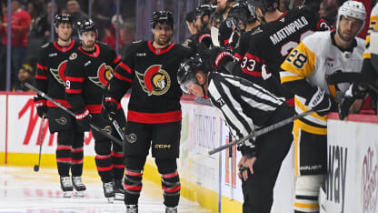 Perron tips puck home to earn 800th point